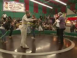 Game "Teufelsrad" and audience watching playing people Stock Footage