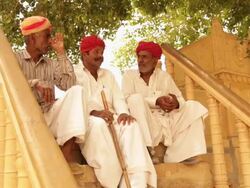 Three rajasthani senior men talking, Jaisalmer, Rajasthan, India Stock Footage