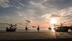 A small fishing community where several boats are moored on the beach in the morning Stock Footage