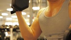 Man Doing Muscle Strength Exercise Workout at GYM Stock Footage