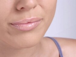 Woman taking a pill Stock Footage