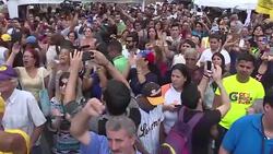 CLEAN : Frustrated Venezuelans finish fingerprinting for referendum News Clip