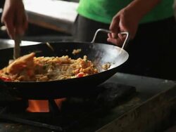 Man cooking food, Delhi, India Stock Footage