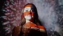 Close up slow motion shot of American flag projections on face of woman / Cedar Hills, Utah, United States Stock Footage
