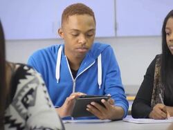 Student uses Digital Tablet Computer in Classroom Stock Footage