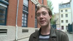 VOICED : Colleagues congratulat News Clip