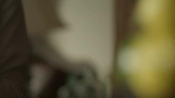 Closeup big bowl of popcorn is salted and picked up. Stock Footage