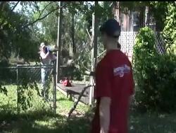 The grim task of finding bodies goes on in Tuscaloosa, Alabama, after tornadoes devastated the city. But it is also a place where volunteers are picking up chainsaws and putting on gloves, clearing away debris. News Clip