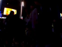 MS Shot of People walking on pedestrian crossing by nights like shadows with city's lights publicity panels / Shibuya, Japan Stock Footage