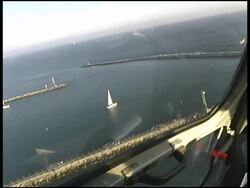 Los Angeles: LAPD Helicopter Flies Around USA Flag on Coast Stock Footage