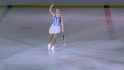 SLO MO Female figure skater waving to her audience Stock Footage