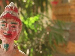 CU SLO MO Head of droll mustached buddhist statue  / Vientiane, Laos Stock Footage