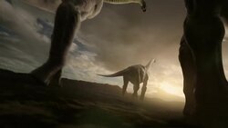 A herd of dinosaurs ambles across a wide, flat plain. Stock Footage