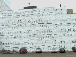 A side of a building painted with musical notes, located on Marquette avenue in Minneapolis Minnesota Stock Footage