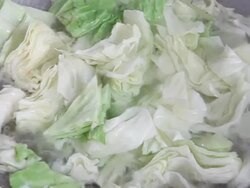 Vegetables are cooked in a pan. Stock Footage