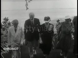 1940: CUBA: WS Capitol building. Sectary of State Cordell Hull (1871-1955) walking up steps w/ wife Frances & others, INT entrance hall. VS Delegates of Organization of American States, reception line, meeting, Cordell Hull signing papers. Pre-Castro. Instructional Video