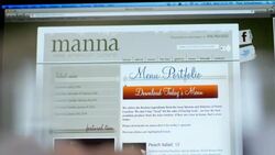 Person on laptop computer studies restaurant website and clicks on Download Today's Menu button Stock Footage