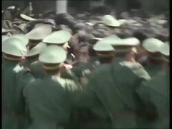 April 27, 1989 FILM MONTAGE MS PAN Rows of police pushing back Tiananmen Square protestors/  Beijing, China/ AUDIO Stock Footage