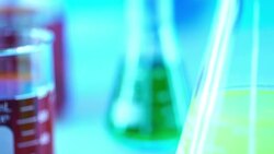 laboratory glassware with color liquid Stock Footage