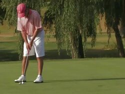 Golfer putting ball, Spain Stock Footage