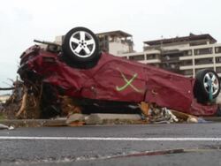 Tornadoe flipped car Stock Footage