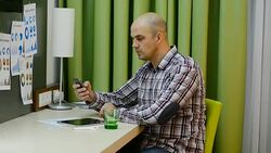 Casual businessman dealing with finances at home office Stock Footage