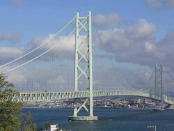 WS View of Akashi Kaikyo Bridge, longest central span of any suspension bridge in world / Awaji, Awaji Island, Japan Stock Footage