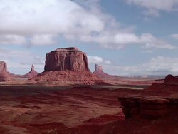 T/L Cloud movement over the scenic red rocks of Monument Valley / Kayenta, Arizona, United States Stock Footage