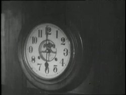 A Japanese woman tucks a young boy into bed as Prime Minister Hideki Tojo announces the Japanese attack on Pearl Harbor. News Clip