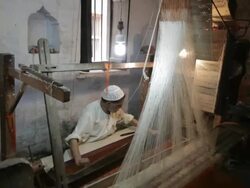 WS TD Man weaving sari on loom / Varanasi, India Stock Footage
