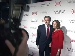 Bono and Damien Hirst Paint the Town Red For Aids In Africa - The (RED) Auction Stock Footage