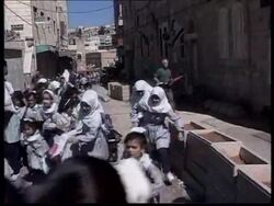 HEBRON : WEST BANK : JEWISH SETTLERS INJURE YOUNG PALESTINIANS News Clip