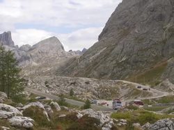 PAN Valparola Pass and the Tre Sassi Fort in Front of Mt. Hexenstein (Sasso di Stria) in the Dolomites Mountains - Motion Controlled Shot. Stock Footage