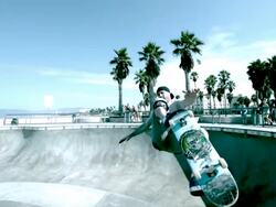 WS SLO MO Shot of skateboarder doing front side air in skate park bowl / Venice, California, United States Stock Footage