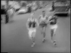 B/W 1962 3 runners coming towards camera on street in 66th Boston Marathon / newsreel Stock Footage