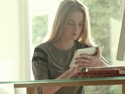 Tablet desk girl    DE  CM  ED Stock Footage