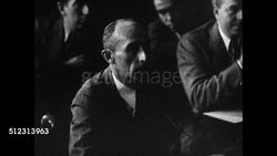 1934: ROUGH SEAS: HD: WS Atlantic Ocean off coast of New Jersey. QUESTIONING PEOPLE: VS People seated at table asking questions, questioning people seated in chairs (No SOT), VS People taking notes, VS People answering questions one at a time. Instructional Video