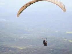 MS TS Two men paragliding / Belo Horizonte, Minas Gerais, Brazil Stock Footage