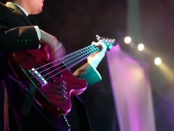 Musician is playing the bass guitar. Stock Footage