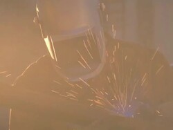 CU Man arc welding next to truck / Boulder City, Nevada, USA Stock Footage