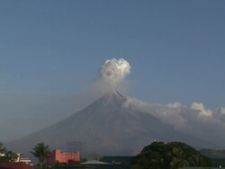 Zoom in on volcanic ash cloud erupting from large volcano, Philippines, Dec 2009 Stock Footage