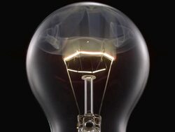 ECU SLO MO Shot of light bulb, showing burning and smoking tungsten wire / Munich, Bavaria, Germany Stock Footage