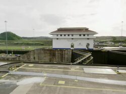 Panama canal locks opening ship crossing Stock Footage