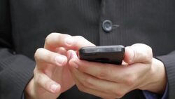 Businessman using mobile phone Stock Footage