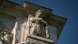 A statue tops a pillar on Rome's Arch of Constantine. Stock Footage