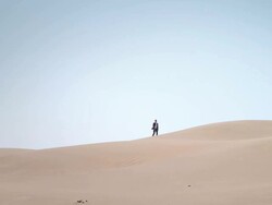 Businessman in desert Stock Footage