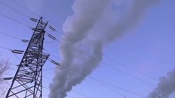 Electric pylon near power plant Stock Footage