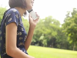 Woman using mobile phone Stock Footage