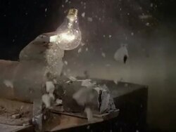 Bulb in exploding vise Stock Footage