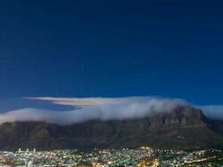 T/L Cloud over Table Mountain, Cape Town at night, South Africa Stock Footage